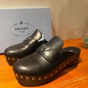 Prada Black Leather Studded Clog Mules with Logo Plaque